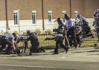 New Ferguson Shooting News: Eric Holder Calls Unidentified Assailant of 2 Police Officers a 'Damn Punk'