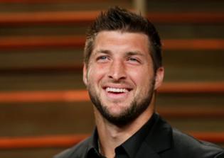 Tim Tebow stops fan's seizure with the power of prayer