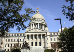 Removal of Christian flag sparks protests in Mississippi town