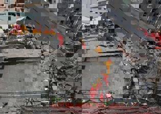 Taiwan developer in custody after deadly quake fells building