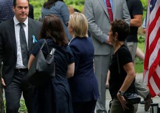 Hillary Clinton falls ill with pneumonia, seen stumbling at 9/11 memorial, cancels California trip