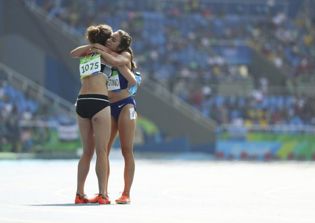 Abbey D'agostina says 'God prepared my heart' after she stops mid-race to help up, encourage fellow athlete to finish race