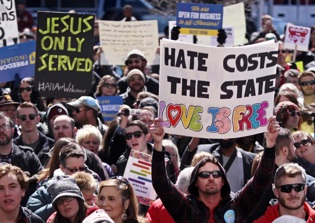 Arkansas, Indiana Revise Religious Freedom Laws After 'Anti-Gay' Accusations and Widespread Protests
