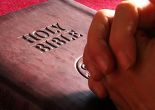 Pastor prays 'in Jesus name' but government official cuts him off