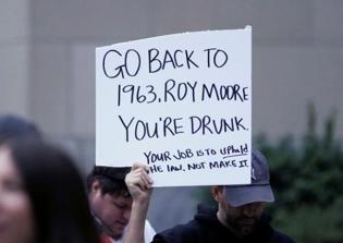 Alabama court suspends Chief Justice Roy Moore for gay marriage license stance