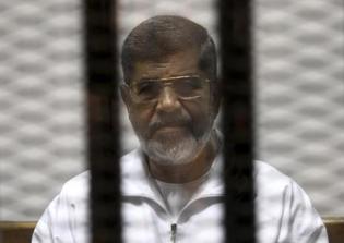 Egyptian court gives death sentence to two Al-Jazeera journalists; Former President Mohamed Mursi's verdict postponed
