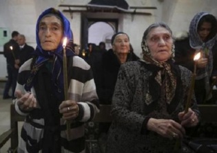 About half of Iraqi and Syrian Christians have fled from their homelands since 2011, report says