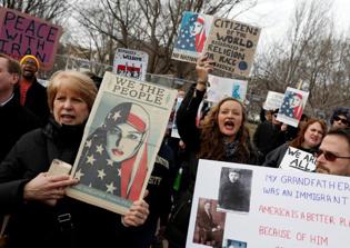 Aid groups are split on Trump's policy to prioritize Christian refugees