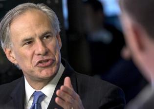 Texas governor signs bill restricting insurance coverage for abortions
