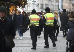 German police begin search for suspect of Christmas market attack as ISIS claims responsibility