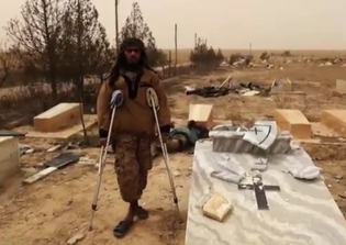 ISIS video shows desecrated Christian cemetery