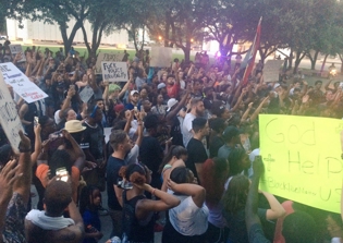 Dallas shootings see four police officers killed, seven wounded by snipers during protests
