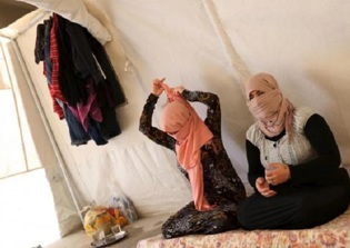 'Vicar of Baghdad' suspended after being accused of paying ransoms to free sex slaves from ISIS