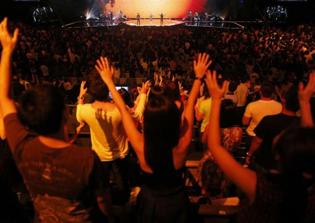 Singaporean court reduces jail term of City Harvest Church leaders convicted in fraud case