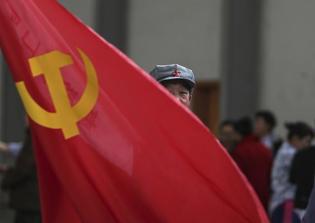 China's Communist Party threatens members with punishment if they don't abandon their faith