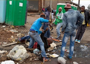 Immigrants Flee South Africa Amid Attacks by Mobs on Foreign-Owned Shops