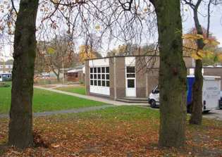 Christian school removes cross from logo, sparking anger among parents