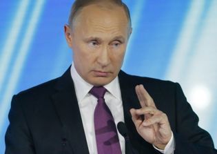Putin claims Communism is similar to Christianity