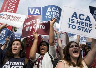 Federal judge halts transgender health care mandate on the same day Catholic groups file lawsuit
