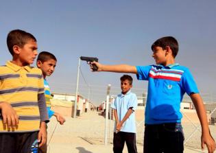 ISIS amputates hands of two children for refusing to kill captives