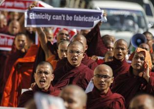 Myanmar's religious affairs minister apologizes to Christians for Buddhist monk's stupa-building in church compound