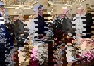 Iranian president pays Pope Francis a visit in Vatican, asks to 'pray for him'