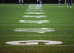 School district bans coach from joining football team in prayer following complaint from secularist group