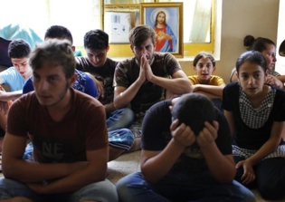 Priest says Iraqi Christians are praying for God to have mercy on ISIS