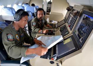 Search Teams Find AirAsia 8501 Tail Wing, Possible Black Box