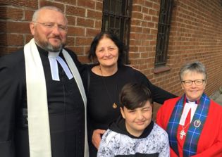 Orphan supported by church minister gets a new home