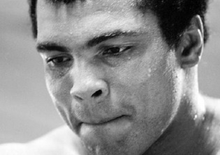 Why did Muhammad Ali convert to Islam?