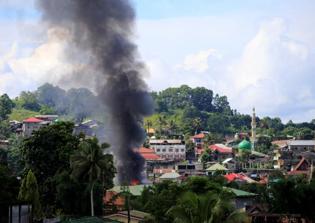 ISIS releases 'unseen' photos of jihadis executing 'belligerent Christians' in the Philippines