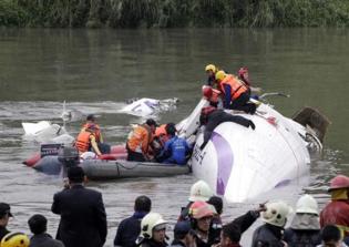Taiwan Plane Tumbles Into River, Killing 26