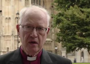 Former archbishop resigns after report found he colluded in concealing evidence of sex abuse