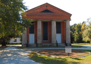 Air Force service members arrested for painting Satanic symbols on historic church