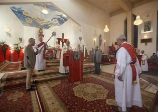 Iraq priests ordained in refugee camp give hope for people to stay in war-torn country
